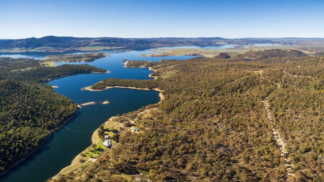 aerial-panorama-snowy-river-flowing-among-green-hills-australian-alps-lake-jindabyne